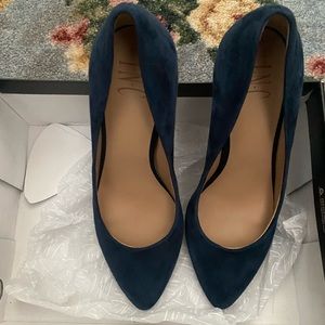 Gently worn blue suede pumps